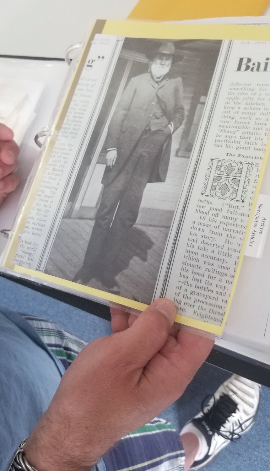 RESEARCH EXHAUSTED: Anthony Ursillo pages through a thick binder full of research he has completed on his home, the former brothel operated by Frederick A. ‘Big Shang’ Bailey.